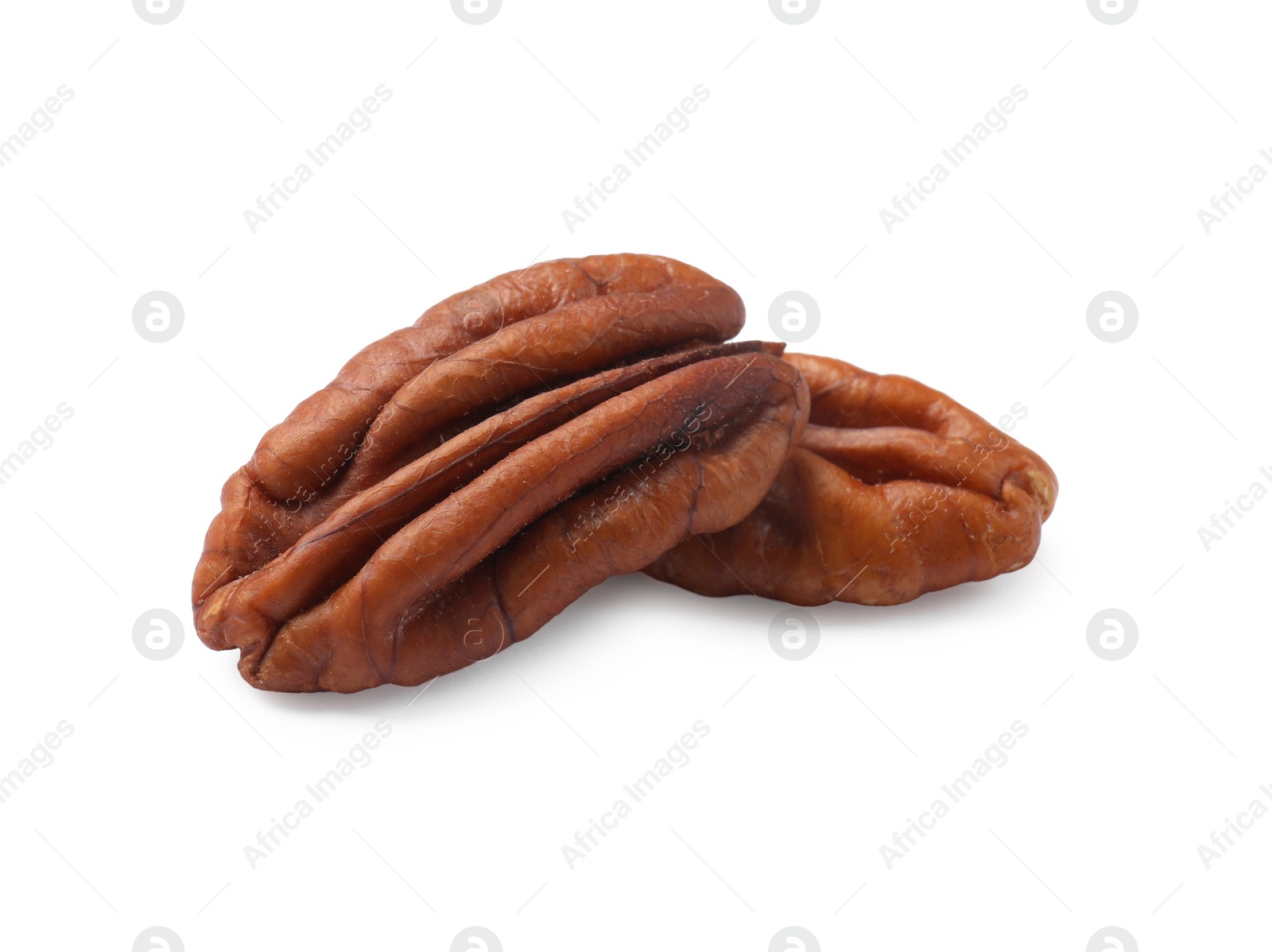 Photo of Two tasty pecan nuts isolated on white