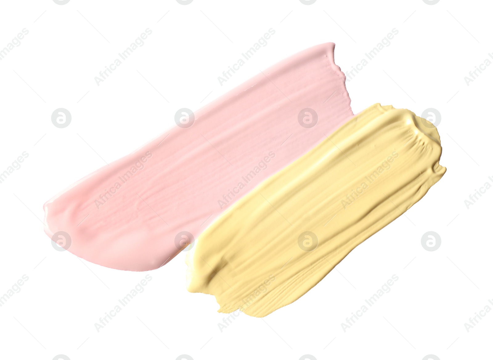 Photo of Strokes of different color correcting concealers isolated on white