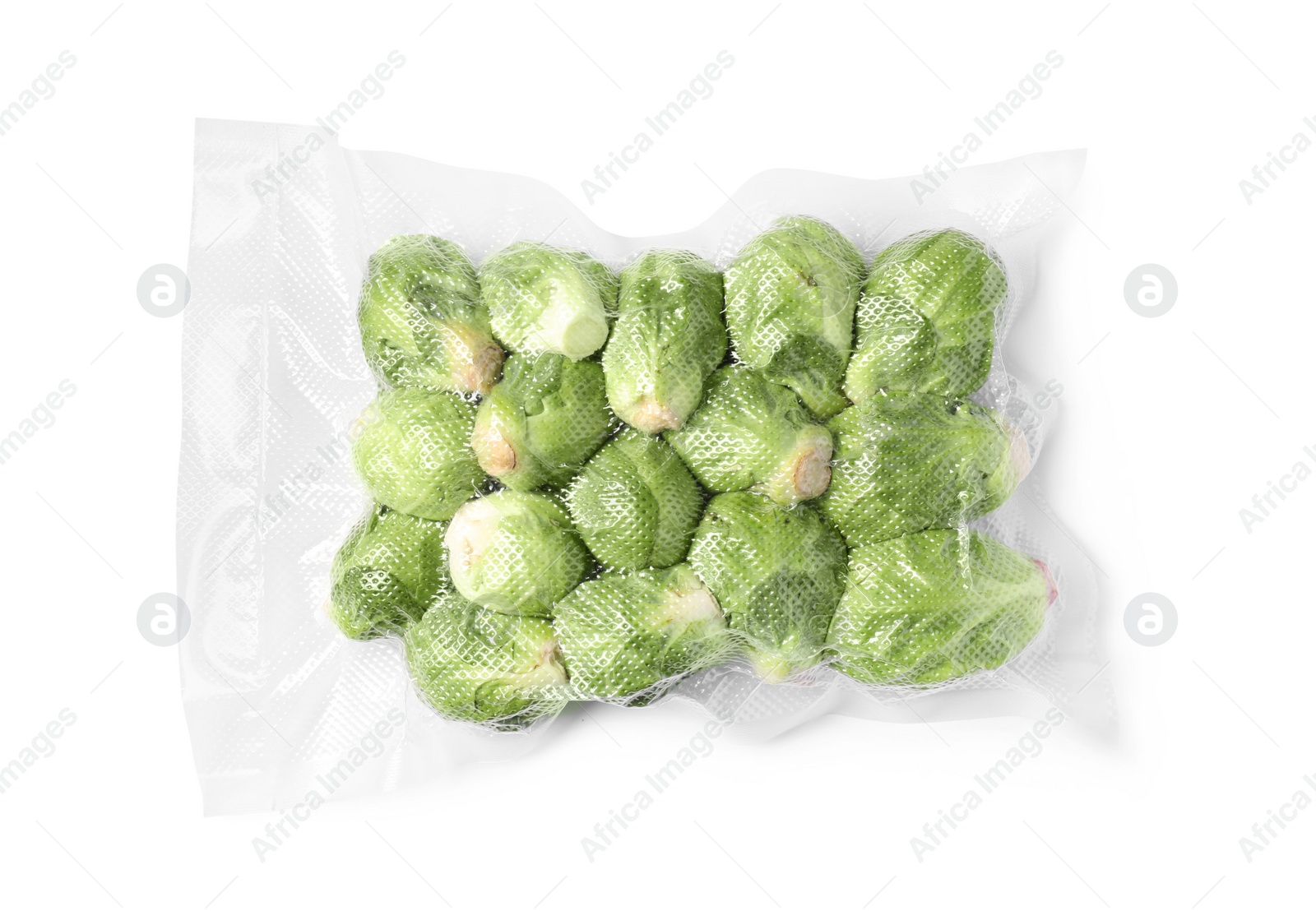 Photo of Vacuum pack of Brussels sprouts isolated on white, top view