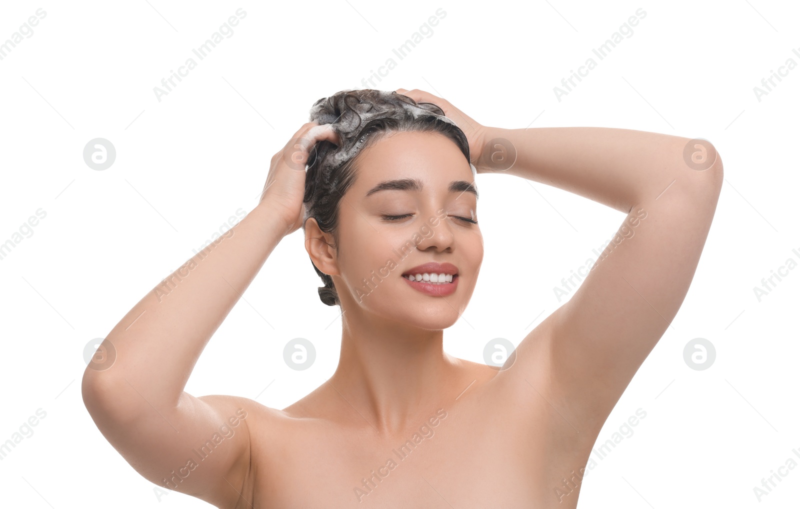 Photo of Beautiful happy woman washing hair on white background