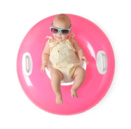 Photo of Cute little baby in sunglasses with inflatable ring on white background, top view