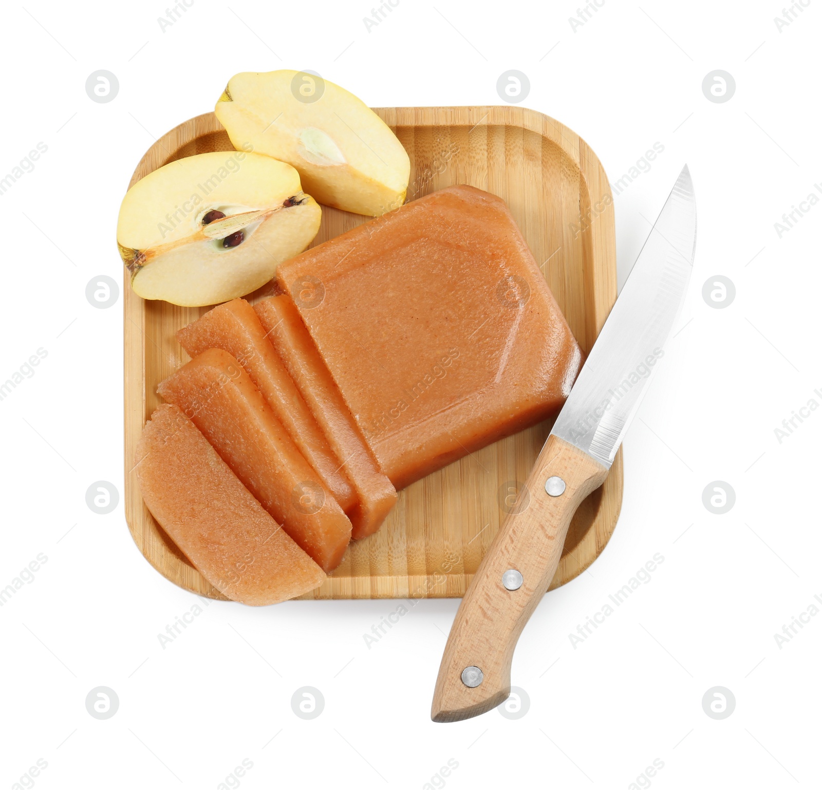 Photo of Delicious sweet quince paste, knife and fresh fruit isolated on white, top view
