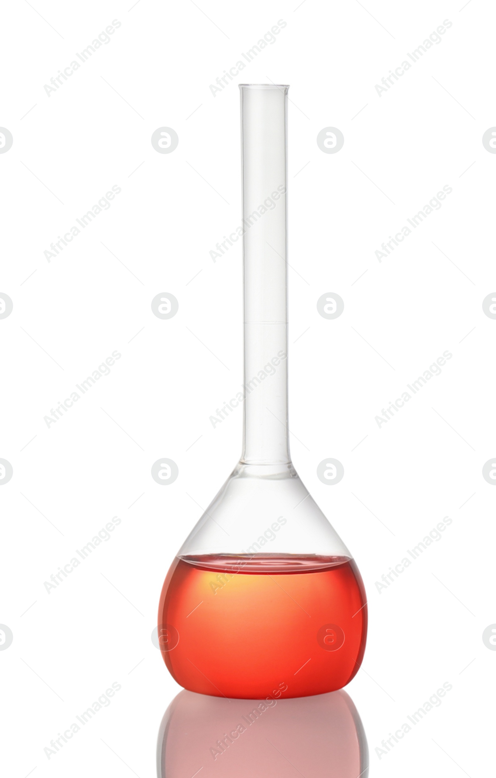 Photo of Volumetric flask with red liquid isolated on white