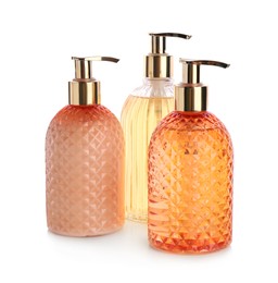 Photo of Stylish dispensers with liquid soap on white background