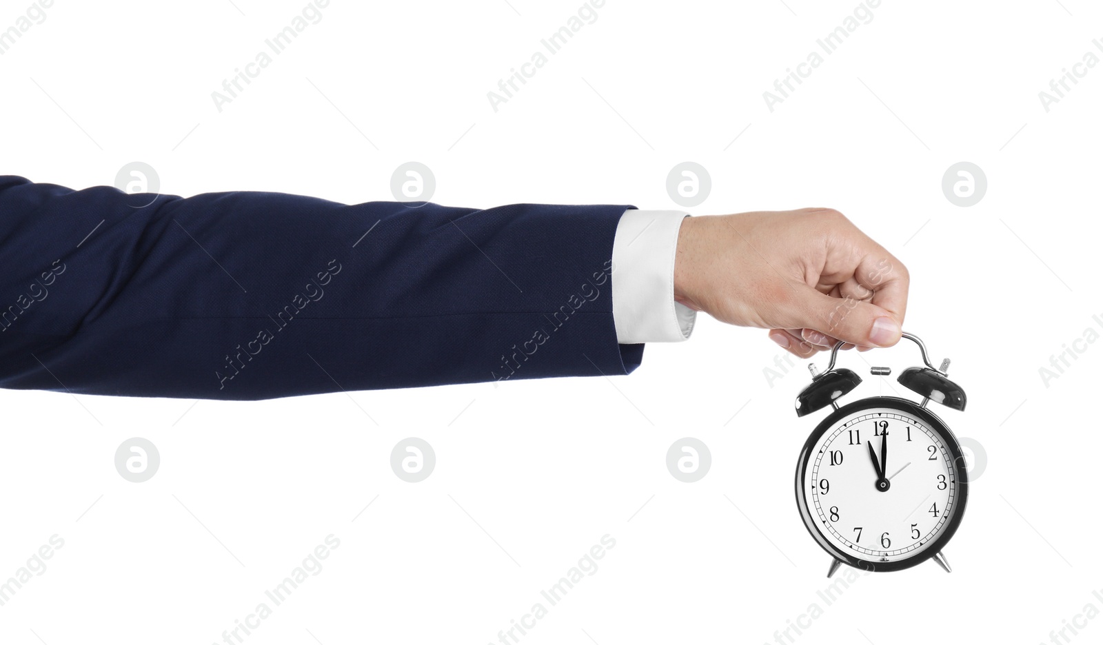 Photo of Young businessman holding clock on white background. Time management