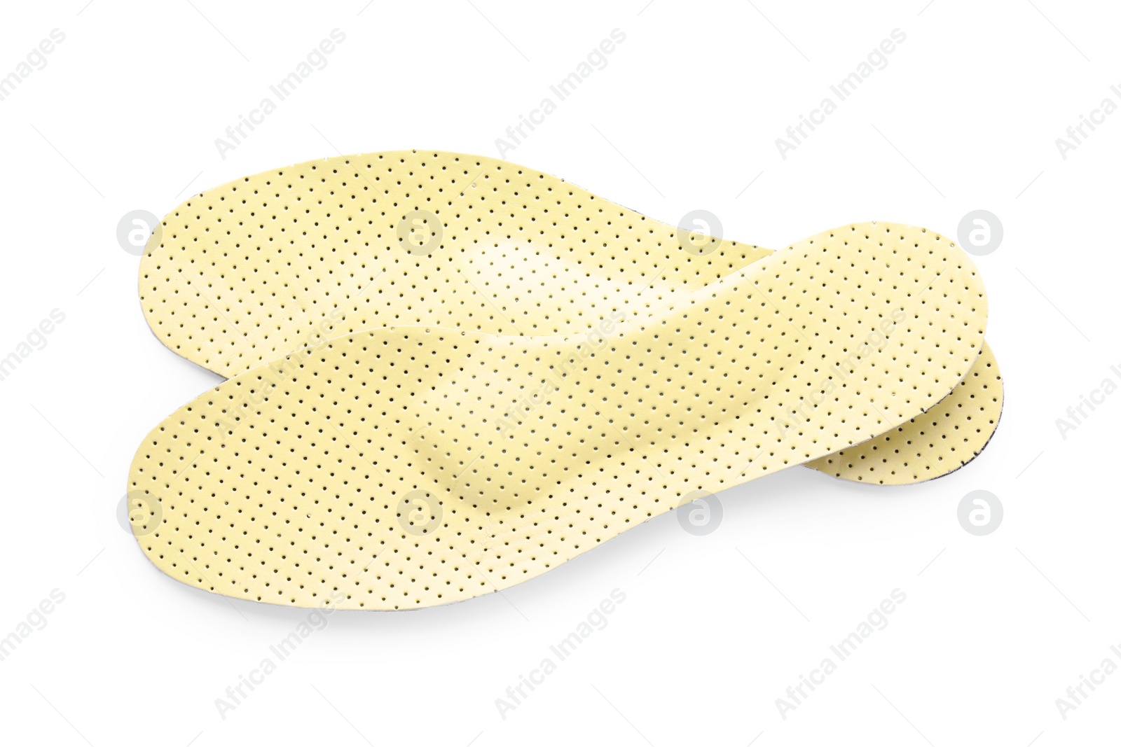 Image of Pair of beige orthopedic insoles on white background, top view