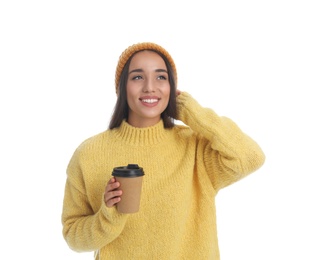 Photo of Happy beautiful woman with paper cup of mulled wine on white background
