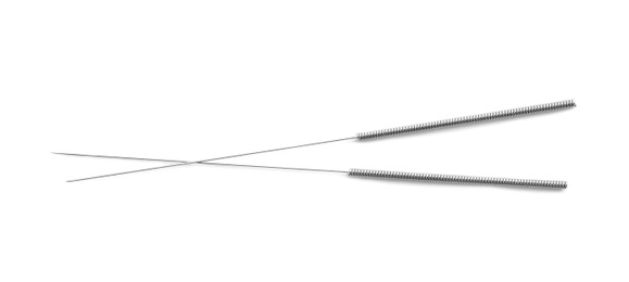 Photo of Needles for acupuncture on white background