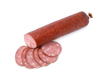 Delicious cut smoked sausage isolated on white, top view