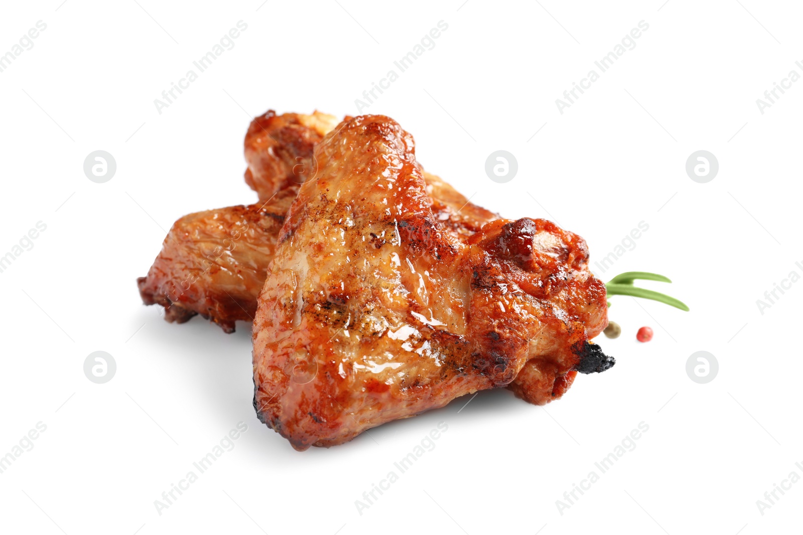 Photo of Delicious barbecued chicken wings on white background