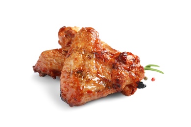 Photo of Delicious barbecued chicken wings on white background