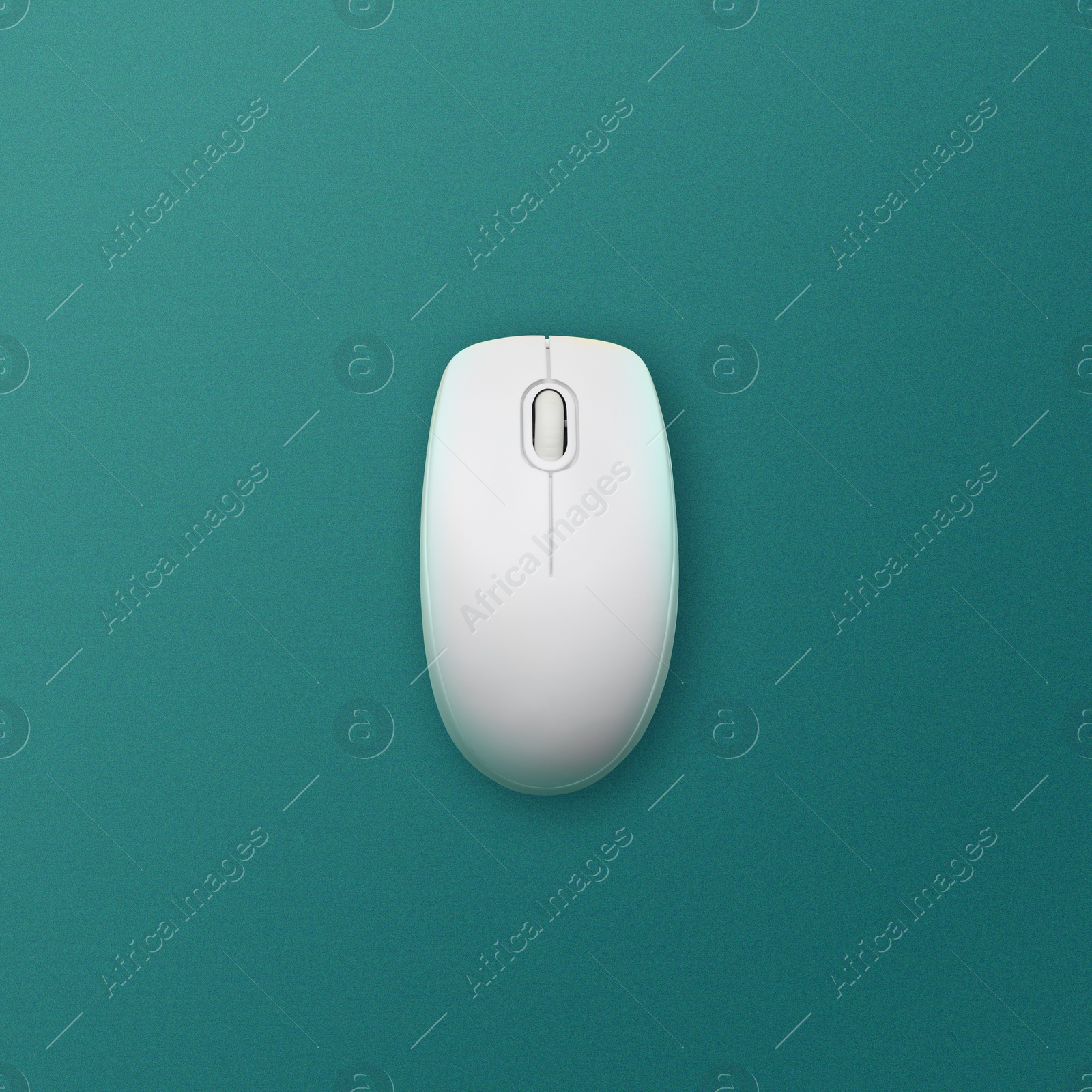 Image of Modern wireless computer mouse on teal background, top view