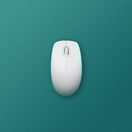 Image of Modern wireless computer mouse on teal background, top view