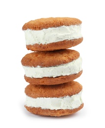 Photo of Sweet delicious ice cream cookie sandwiches on white background