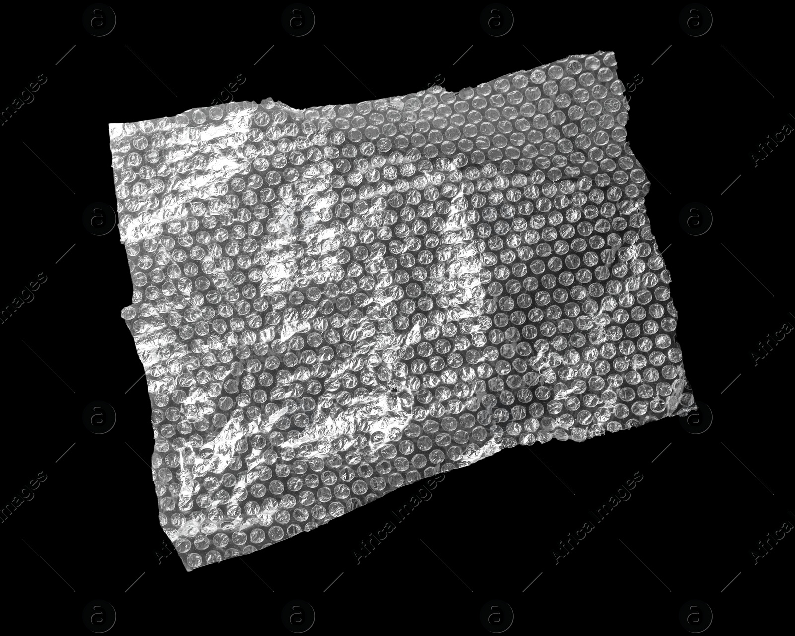 Photo of Transparent bubble wrap on black background, top view