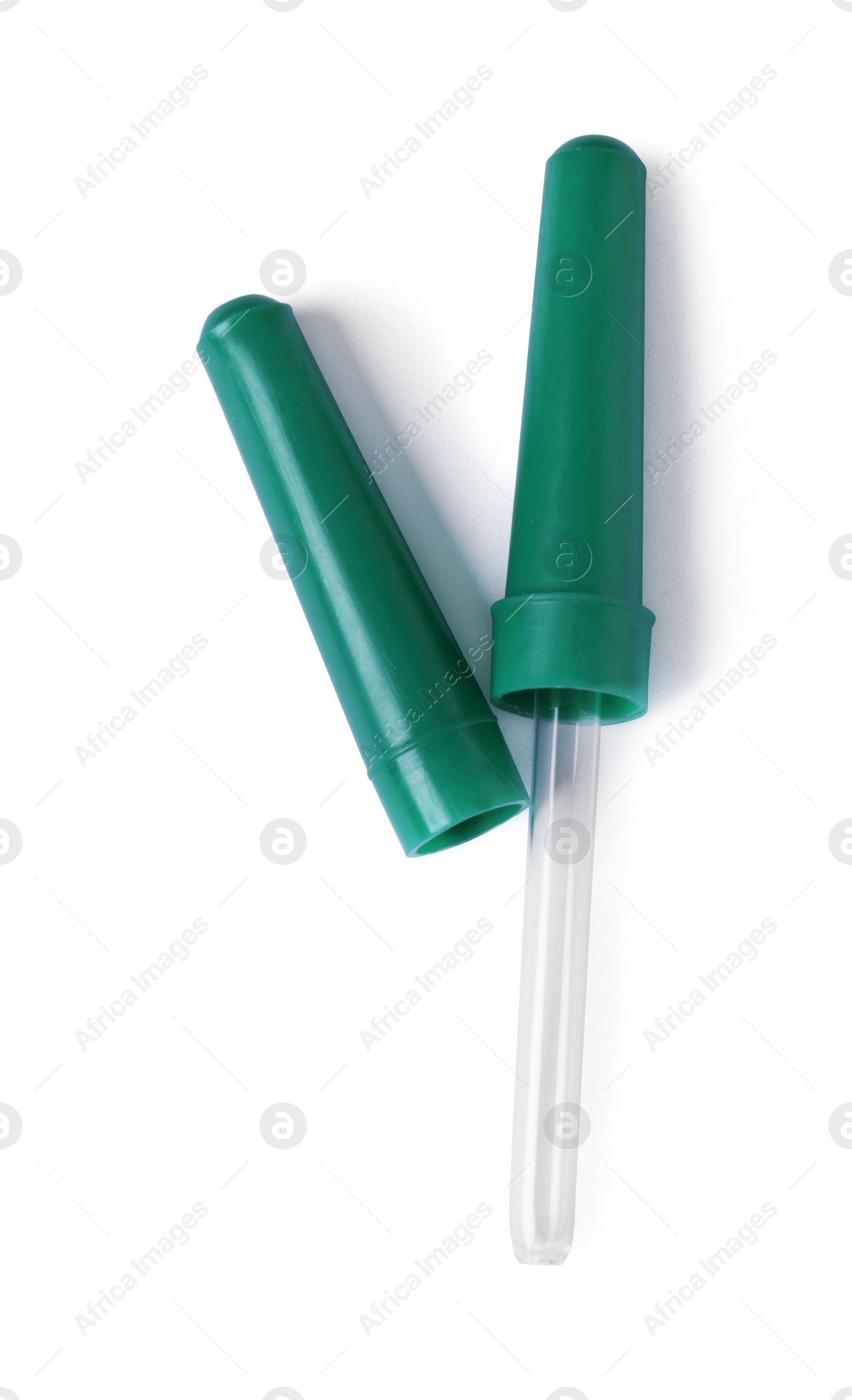 Photo of One glass clean pipette isolated on white, top view