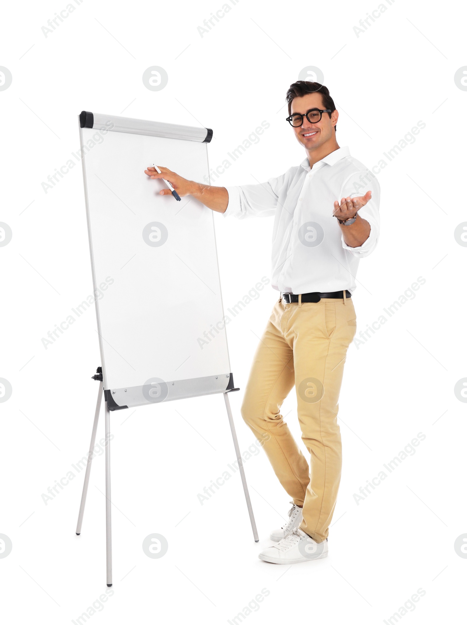 Photo of Professional business trainer near flip chart on white background