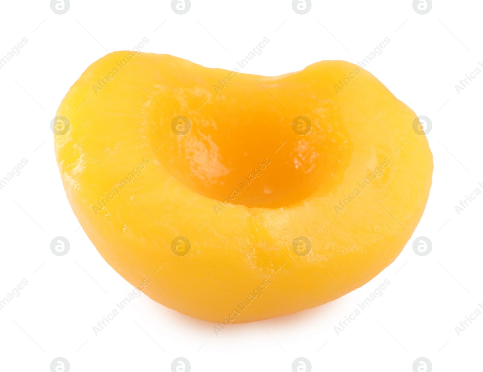 Photo of Sweet juicy canned peach half isolated on white