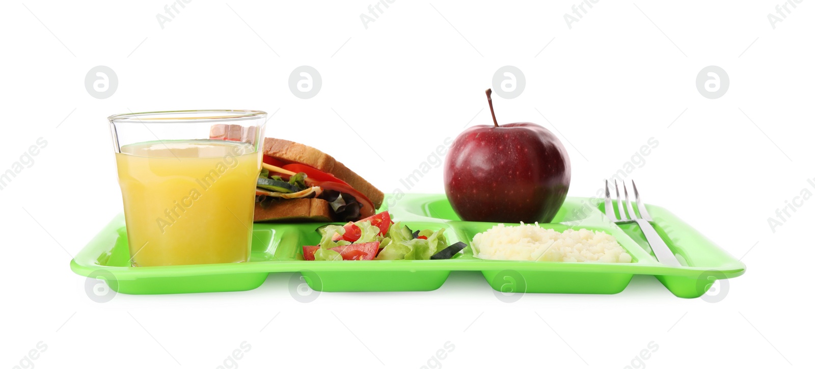 Photo of Tray with tasty food and juice on white background. School lunch