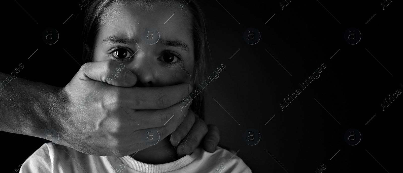 Image of Man covering scared little girl's mouth on black background, space for text. Domestic violence. Banner design