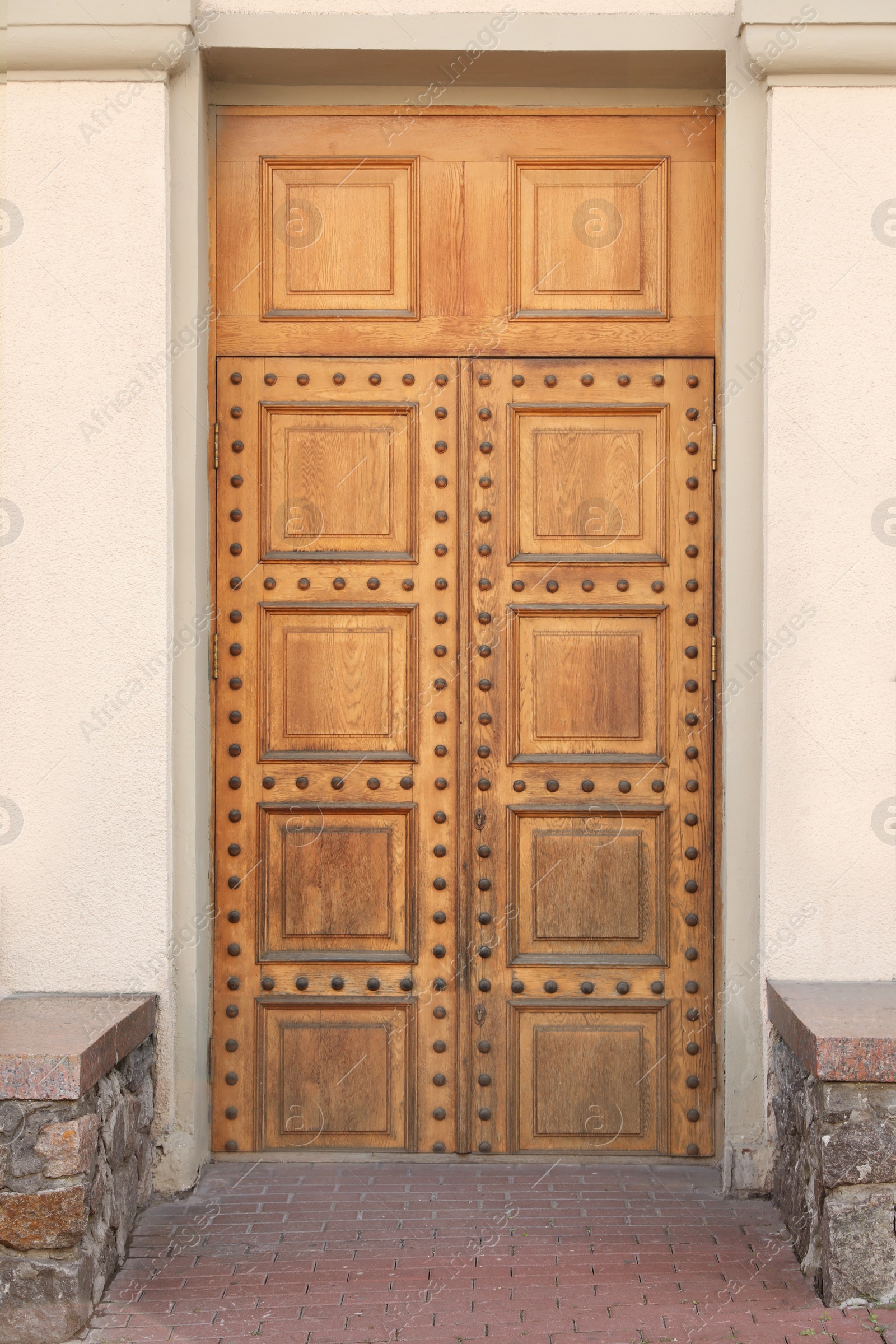 Photo of Building with vintage wooden door. Exterior design