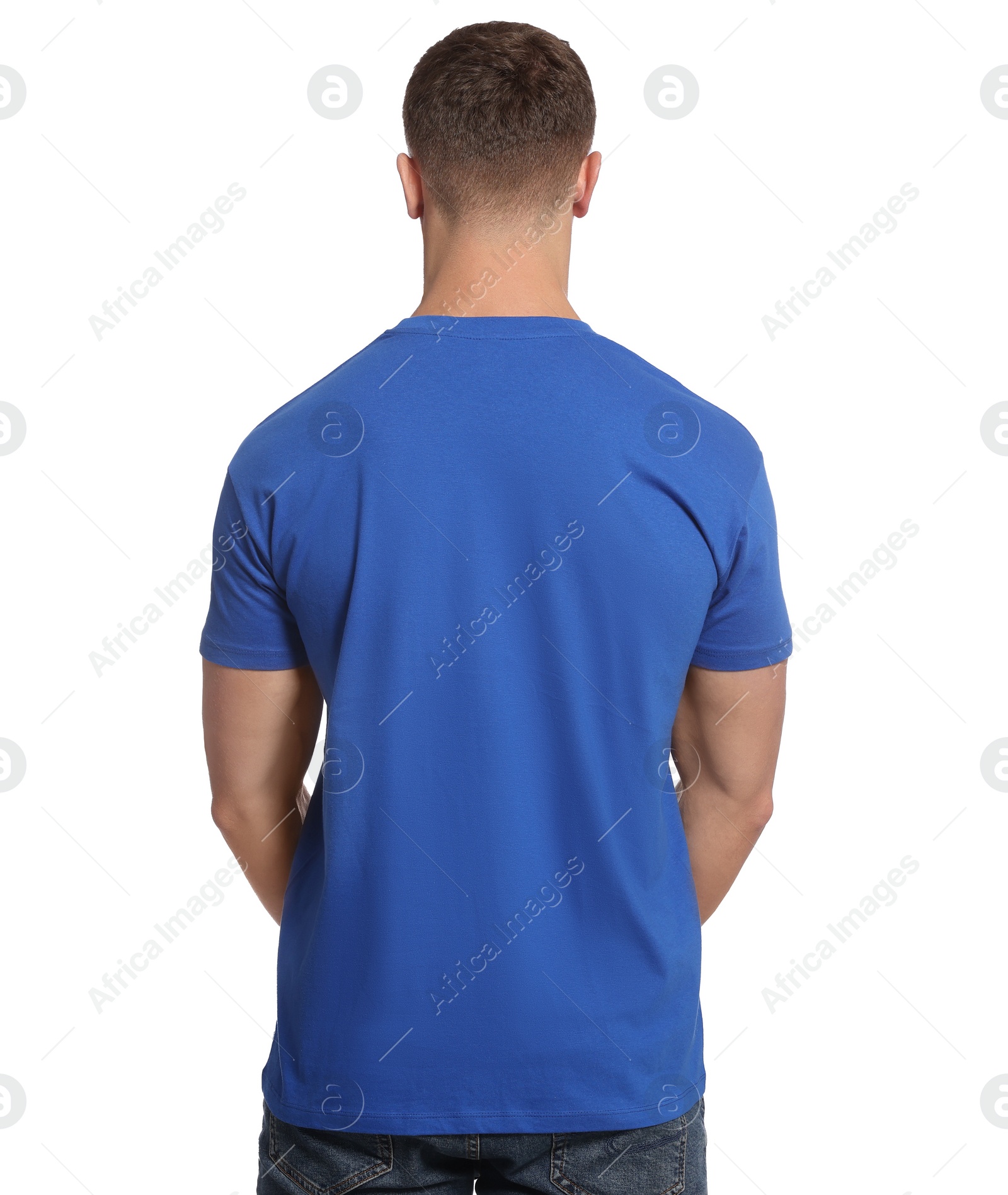 Photo of Man wearing blue t-shirt on white background, back view. Mockup for design