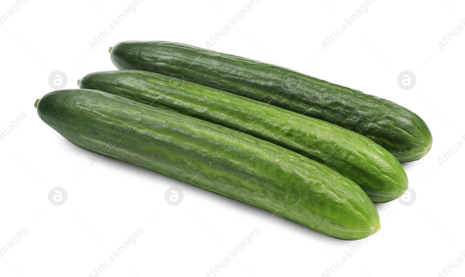 Photo of Many long fresh cucumbers isolated on white