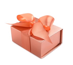 Gift box decorated with satin ribbon and bow on white background