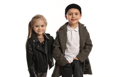 Photo of Fashion concept. Stylish children posing on white background