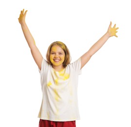 Photo of Teen girl covered with yellow powder dye on white background. Holi festival celebration
