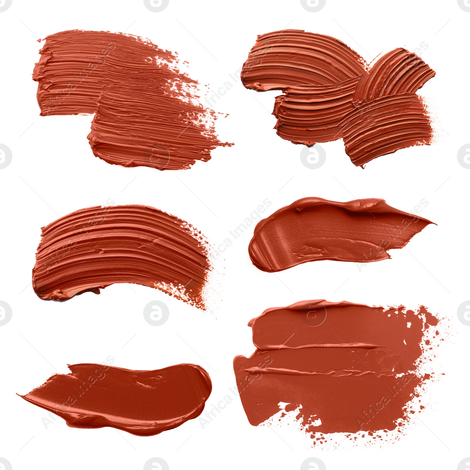 Image of Brown oil paint strokes isolated on white, top view