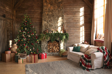 Festive interior with decorated Christmas tree and fireplace