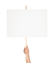 Woman holding blank protest sign on white background, closeup