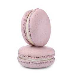 Photo of Violet macarons on white background. Delicious dessert