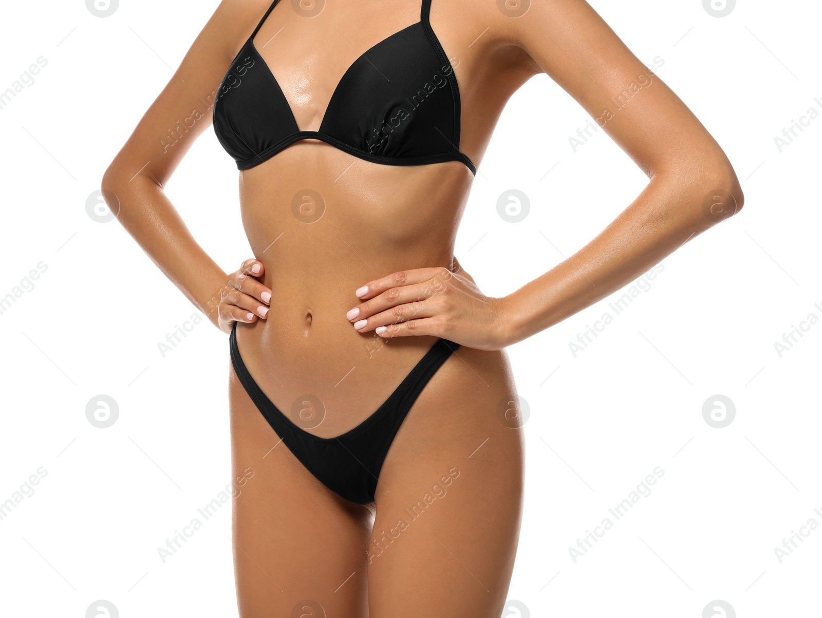 Photo of Sexy young woman in stylish swimsuit isolated on white, closeup. Beach body goal