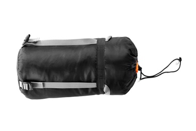 Photo of Rolled sleeping bag on white background. Camping equipment