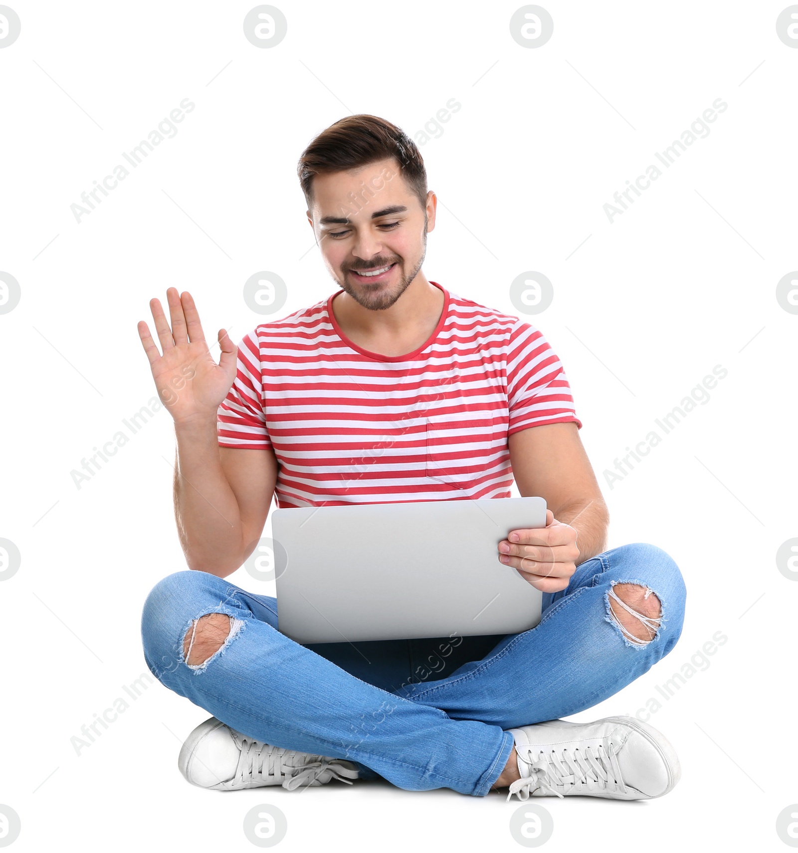 Photo of Man using laptop for video chat isolated on white