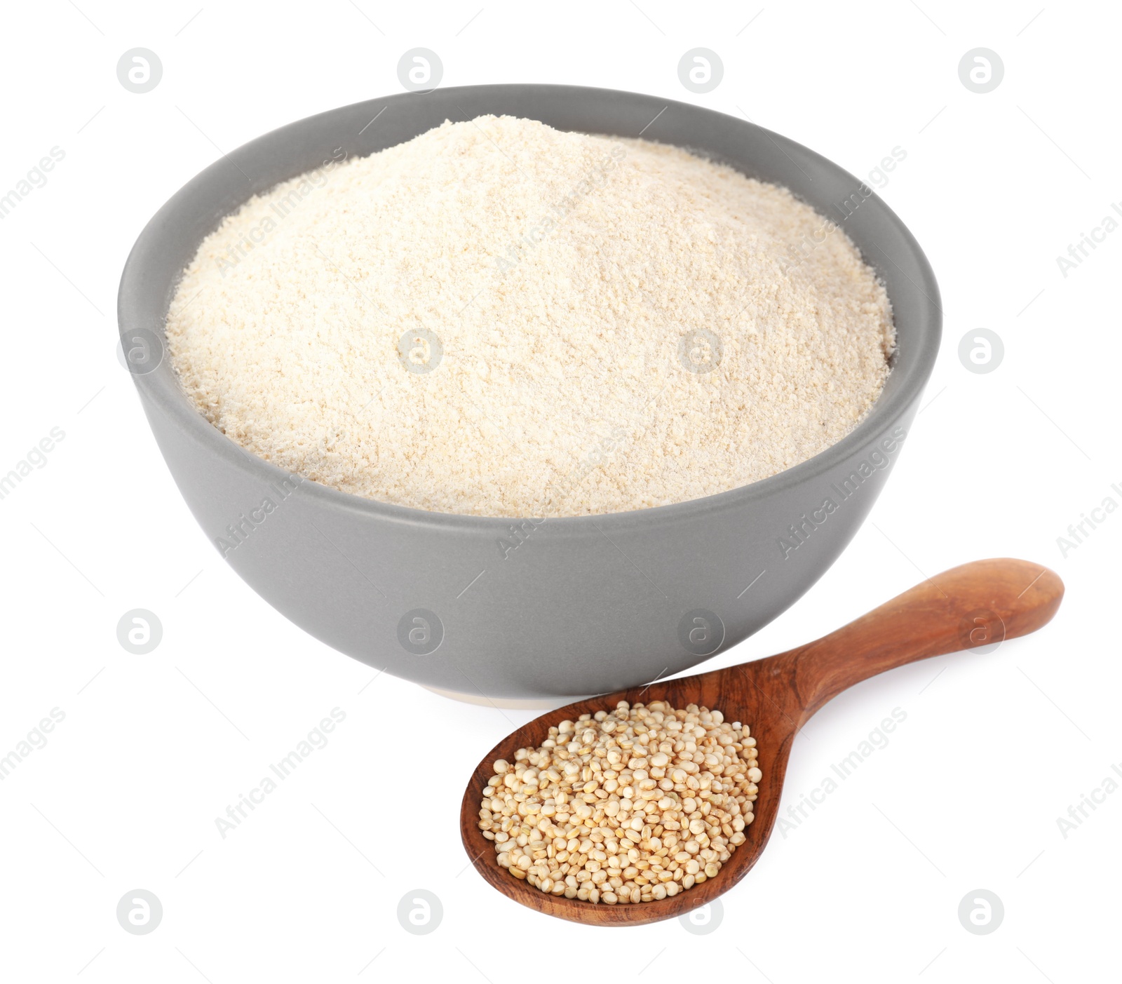 Photo of Quinoa flour in ceramic bowl and wooden spoon with seeds on white background