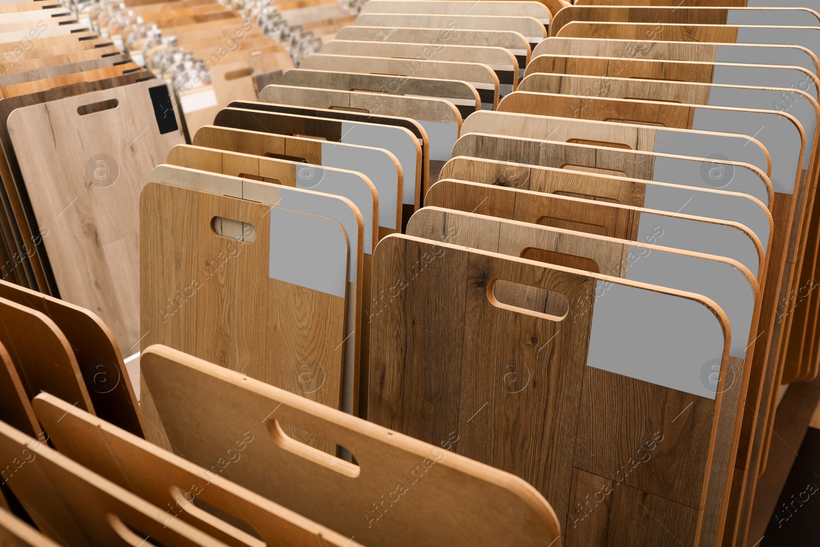 Photo of Many different samples of wooden flooring in store