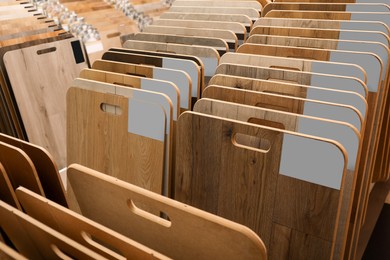 Photo of Many different samples of wooden flooring in store