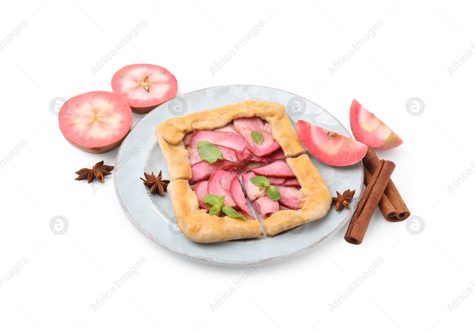 Photo of Delicious apple galette with mint and ingredients isolated on white