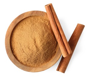 Photo of Dry aromatic cinnamon sticks and powder isolated on white, top view