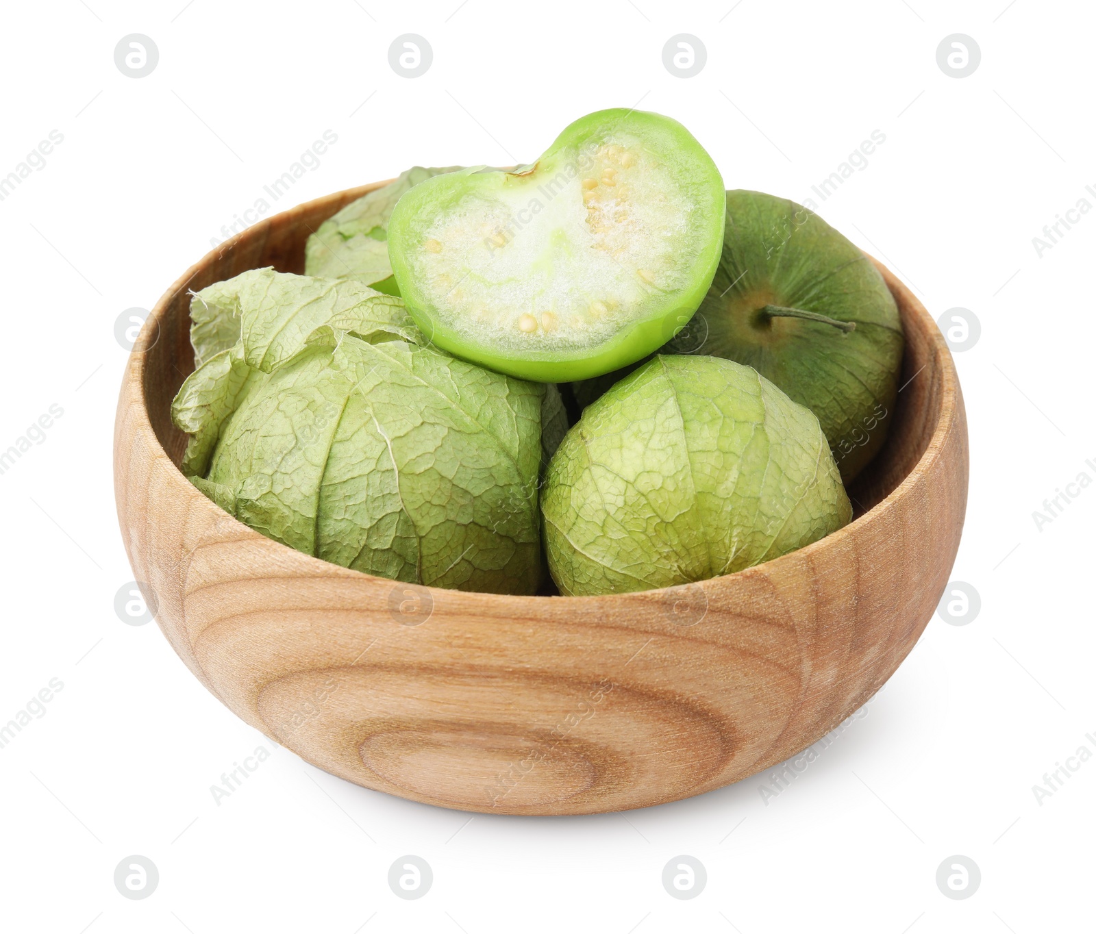 Photo of Fresh green tomatillos with husk in bowl isolated on white