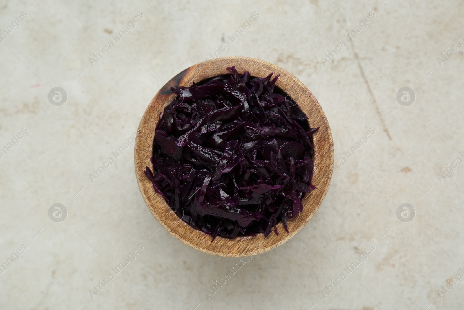 Photo of Tasty red cabbage sauerkraut on table, top view