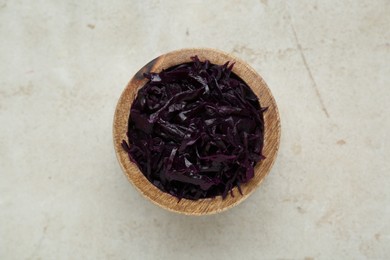 Tasty red cabbage sauerkraut on table, top view