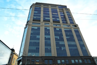 Photo of KYIV, UKRAINE - MAY 23, 2019: Modern business center SENATOR against sky with clouds