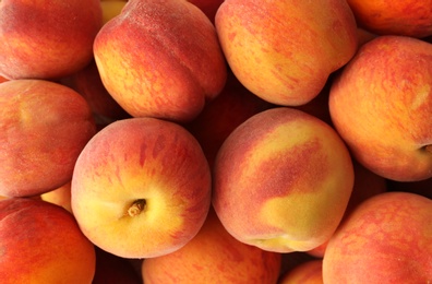 Photo of Fresh sweet ripe peaches as background