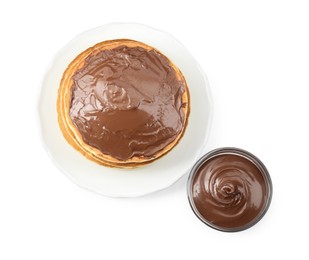 Photo of Tasty pancakes with chocolate paste isolated on white, top view