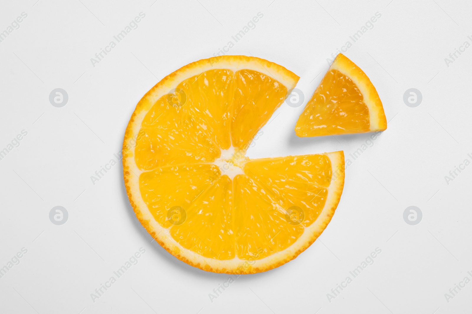 Photo of Slices of juicy orange on white background, top view