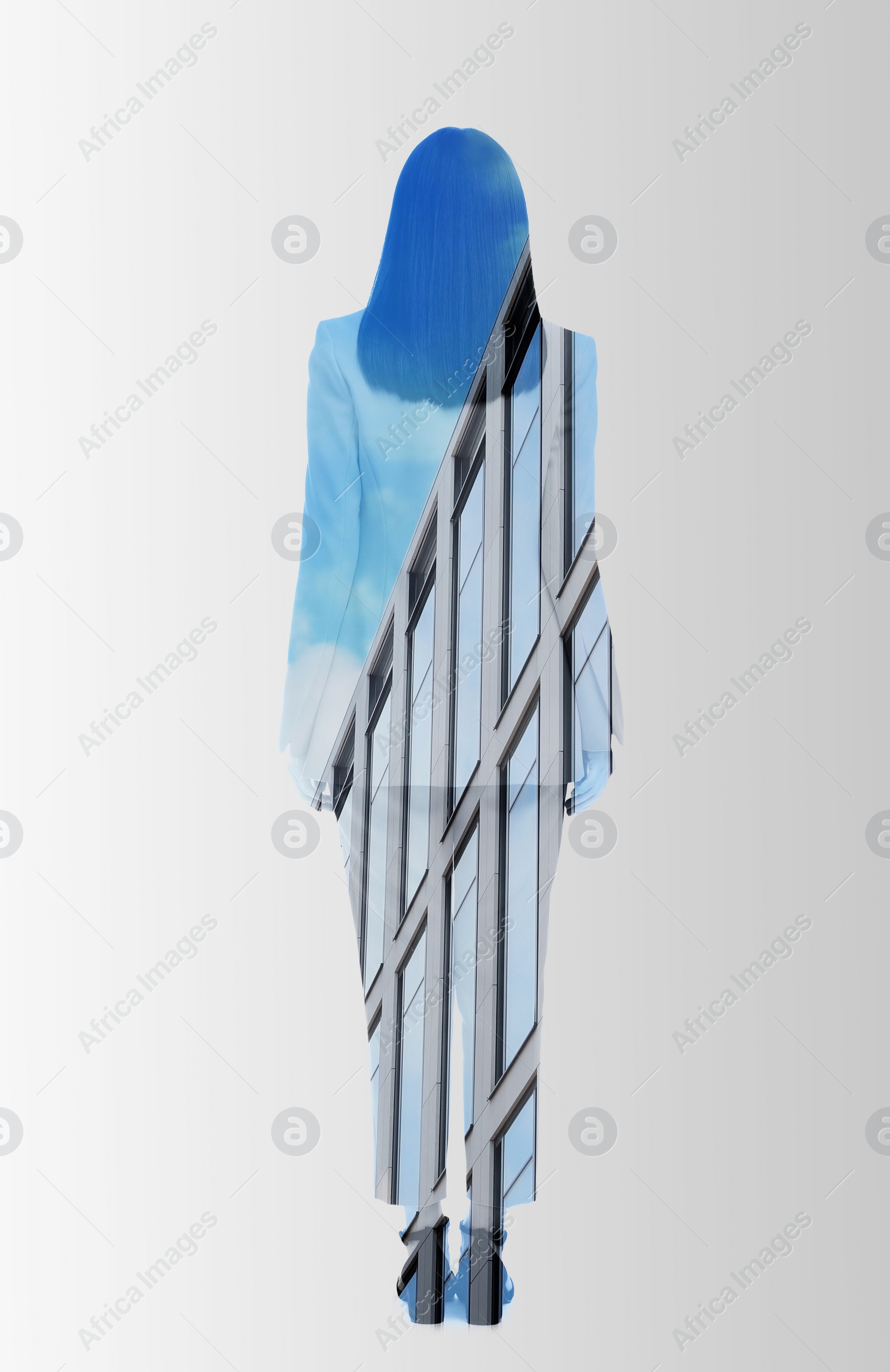 Image of Double exposure of businesswoman and office building